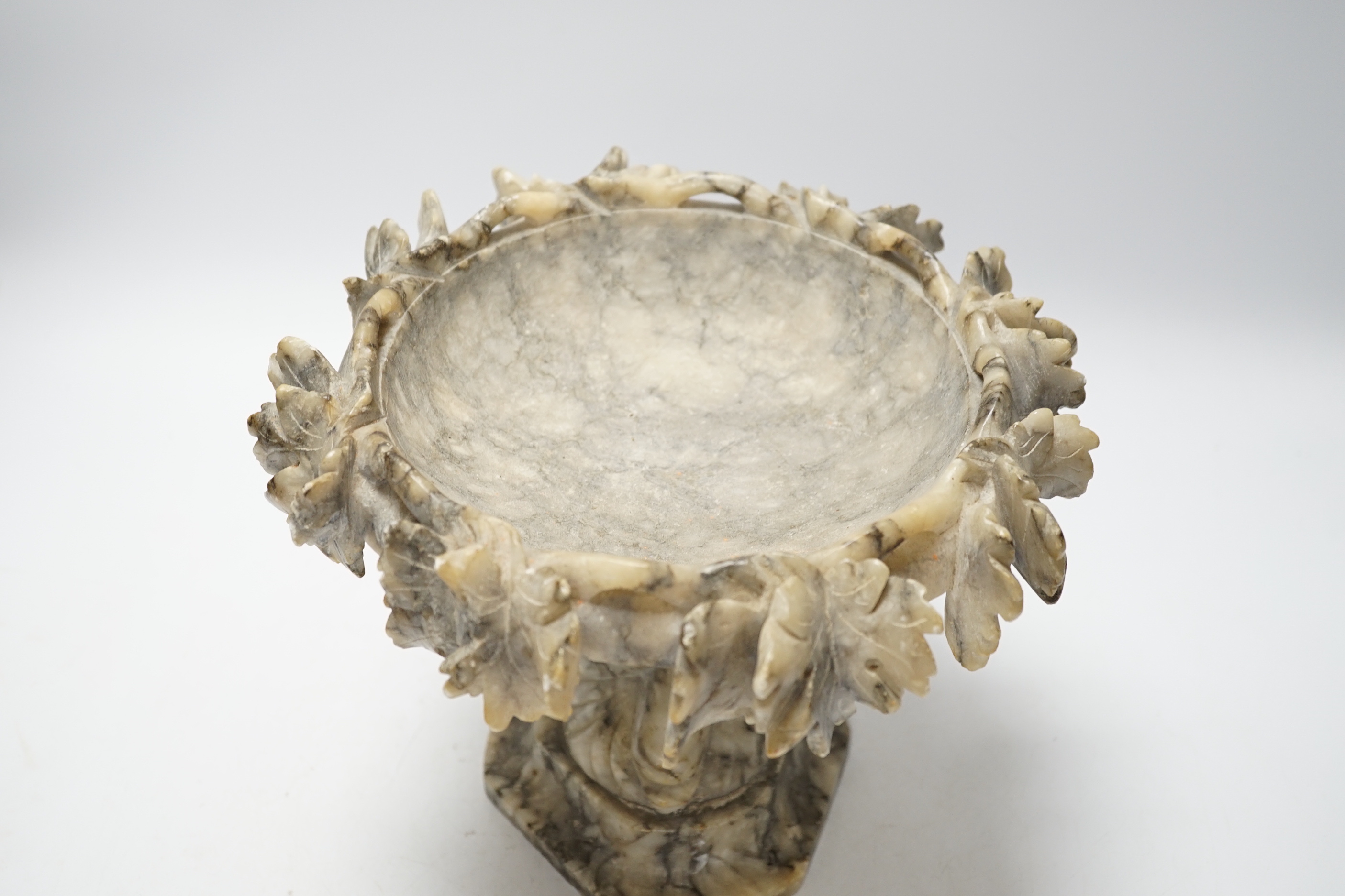 A carved alabaster Tazza centrepiece, 21cm high